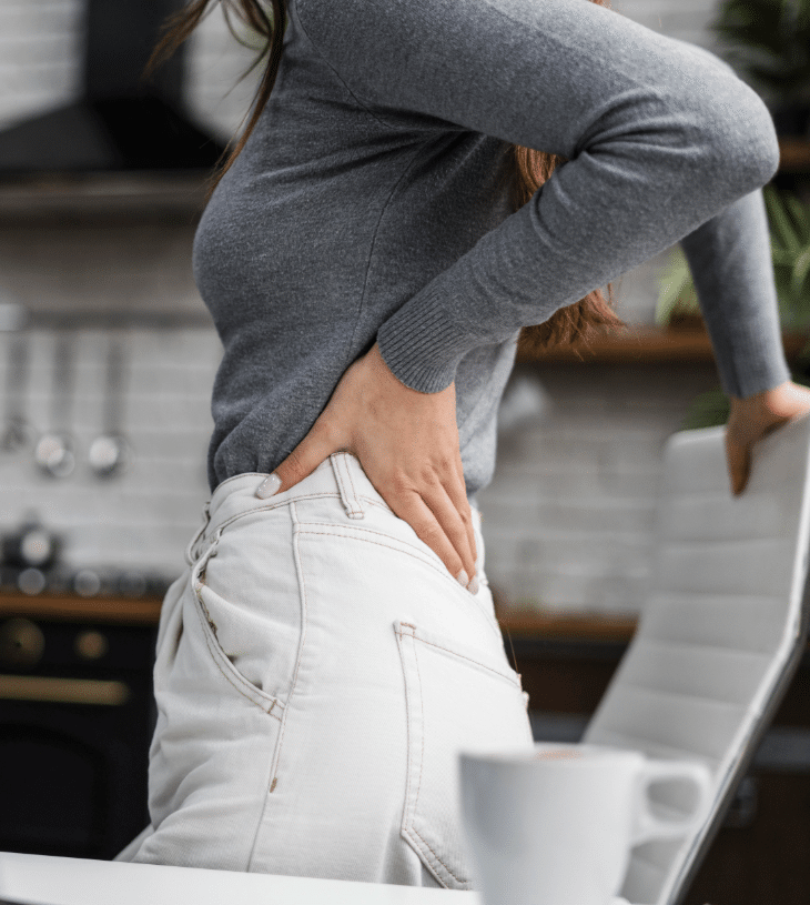side view woman having backache while working from home jpg 7952×5304 04 28 2025 08 37 PM